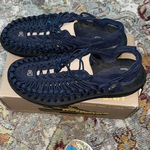 Keen navy blue men’s sandal.  Waterproof. Worn twice, brand new condition.